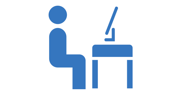 Clipart: Une personne assise devant un écran posé sur un bureau.